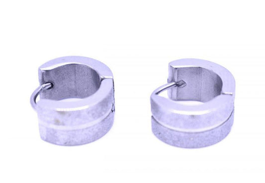 Silverfärgade ringörhängen med glitter