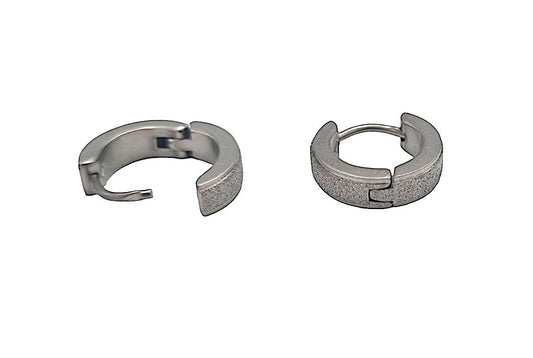 Silverfärgade ringörhängen med glitter